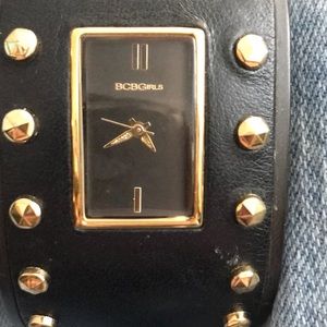 Black leather, gold studded watch.